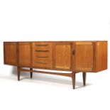 A mid-century G Plan (red label) teak sideboard.