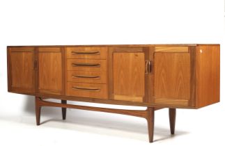 A mid-century G Plan (red label) teak sideboard.