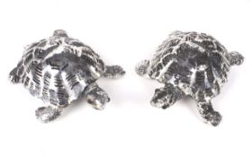 Two Christofle white metal models of tortoises.