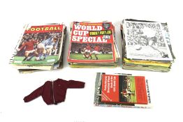 A collection of vintage football magazines.