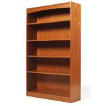 A freestanding bookcase with three adjustable shelves.