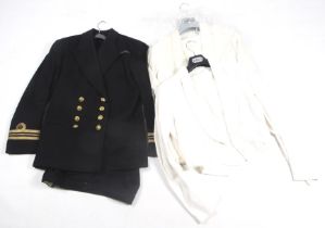 A vintage Baker & Co Naval Officers dress uniform and two white 'Tropical' dress jackets.