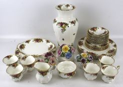 A Royal Albert 'Old Country Roses' ceramics and three floral ornaments.