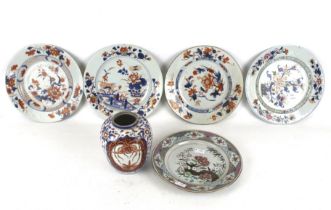 Five 18th century Chinese style plates and a vase. All decorated with flowers, architecture, etc.