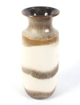 A West German vase glazed in cream and brown.