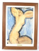 A Modigliani poster depicting a nude woman.