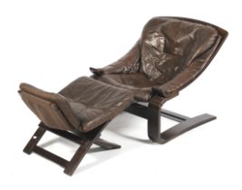 An Ake Fribytter 'Apollo' mid-century cantilever lounge chair and matching footrest.