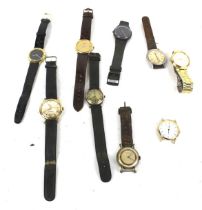 An assortment of vintage gentleman's watches. Including examples by Adamex, Seiko, Rotary, etc.