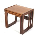 A mid-century G Plan (red label) nest of three teak tables. Max.