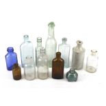 A collection of vintage glass bottles.