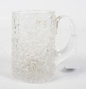 A mid-century Whitefriars clear glass mug tankard. With 'bark' effect decoration.