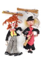 Two vintage Pelham Puppets.