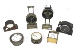 A collection of assorted mantel clocks.