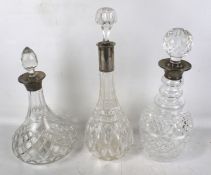 Three silver necked decanters. One marked Charles S Green & Co Ltd, Birmingham 1978, Max.