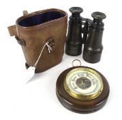 A pair of Lemaire Fabt, Paris binoculars and a barometer.
