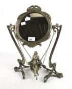 An Art Nouveau style silver plated swing mirror.