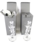 A pair of Waterford Crystal seahorse candlesticks.