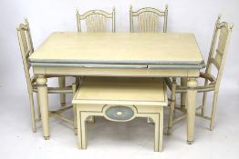 A painted set of dining room table and chairs and a matching coffee table.
