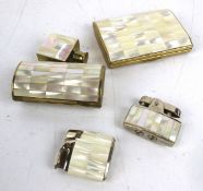 A selection of mother of pearl smoking sets. Including a snuff box, two Ronson lighters, etc.