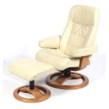 A swivel easy recliner lounge armchair and matching footstool.