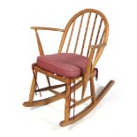 A vintage Ercol child's bentwood rocking chair.