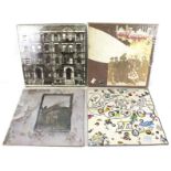 Four Led Zeppelin vinyl records.