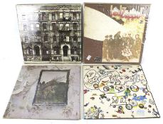 Four Led Zeppelin vinyl records.