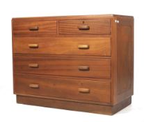 A mid-century teak chest of drawers. Consisting of two short over three long drawers.