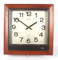 A vintage battery operated Seiko Quartz striking office wall clock. With Arabic numerals, ref.