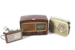 A collection of three radios.