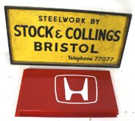 A Honda dealership sign and a Bristol company advertising sign. Max.