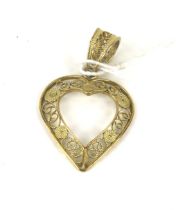 A Continental 14ct gold filigree open-heart shaped pendant.