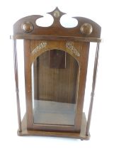 A display cabinet remodelled from a clock by Ray Robinson.