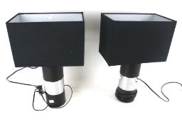 A pair of table lamps with rectangular shades.