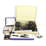 An assortment of costume jewellery. Including a boxed Geneva watch set, cufflinks, necklaces, etc.