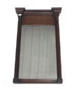A 20th century mahogany tabernacle wall mirror.