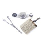 An assortment of silver and white metal items. Comprising a pair of glove stretchers, 87.