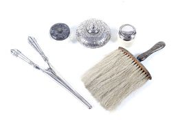 An assortment of silver and white metal items. Comprising a pair of glove stretchers, 87.