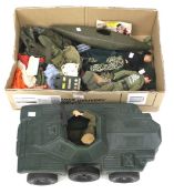 An assortment of Action Man figures and accessories.