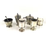 Two Victorian and later three piece cruet sets.