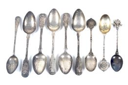 Five William IV Scottish silver fiddle and shell pattern teaspoons and other spoons.