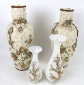 A pair of Maiolica style vases and two opaque glass vases.