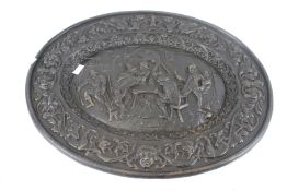 A cast metal oval Husquvana wall plaque depicting a bar scene.