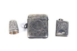 A late Victorian/Edwardian silver vesta/match case and other items.