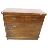 A chest of drawers of two short over two long drawers.