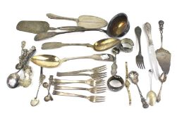 An assortment of silver, white metal and silver plated flatware.
