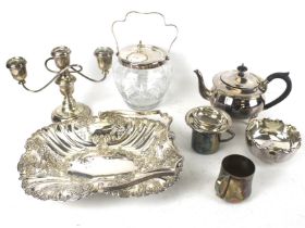 A collection of silver plate. Including a fruit basket, biscuit barrel, etc.