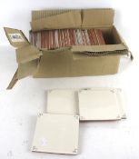 A box of ceramic wall tiles.