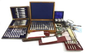 A box of silverplated flatware and truncheon.