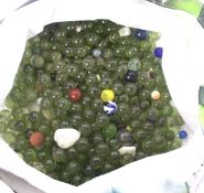 A large collection of assorted vintage glass marbles. Mostly clear from Codd bottles, etc.